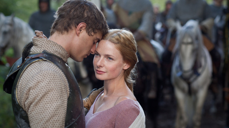 Max Irons and Rebecca Ferguson embracing