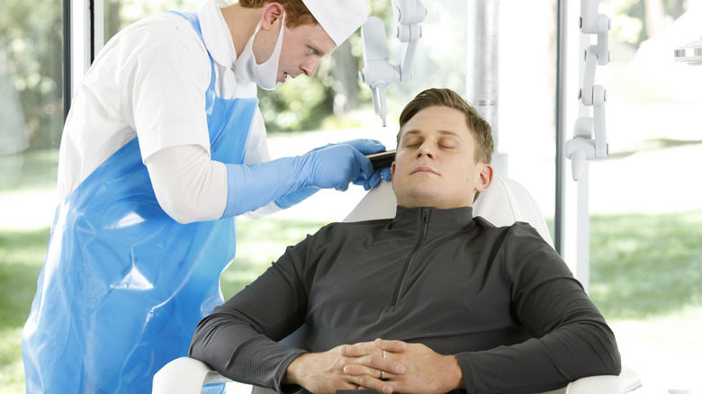 The main character relaxes for a medical treatment