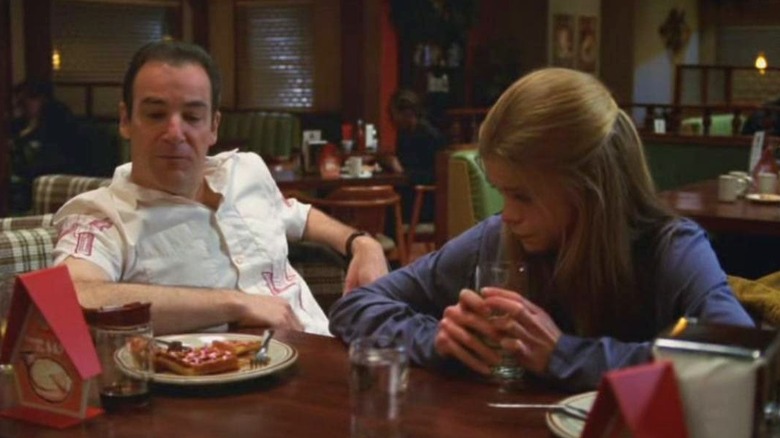 George and Rube sit at their diner booth