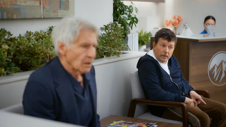 Harrison Ford as Paul and Michael J. Fox sitting in a doctor's waiting room on Shrinking
