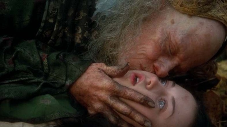 Sigourney Weaver's Crone caressing Snow White in Snow White: A Tale of Terror