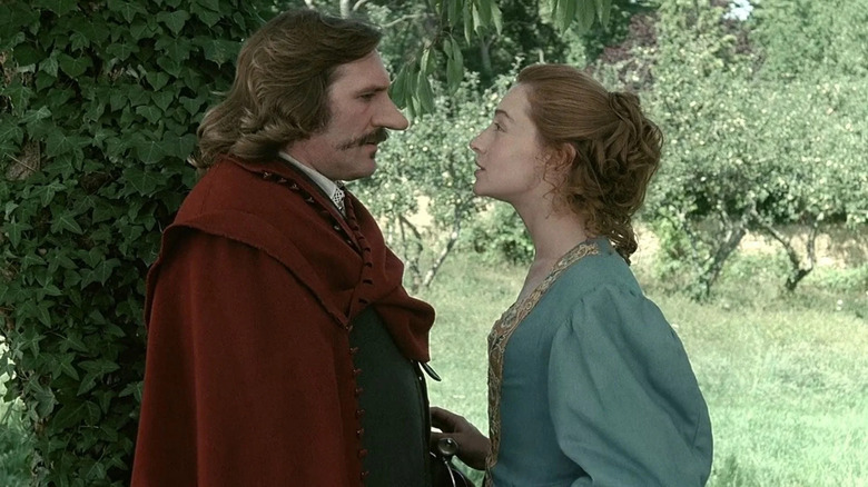 Cyrano talking Roxane in a garden in Cyrano de Bergerac