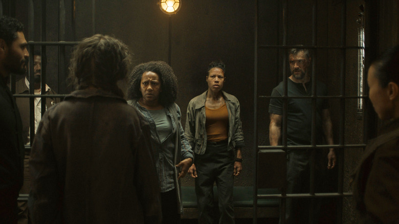 Carla and the other Martha Walker mechanical rebels stare in disgust at Cielo