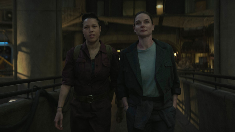 Shirley and Juliette walking together in Silo