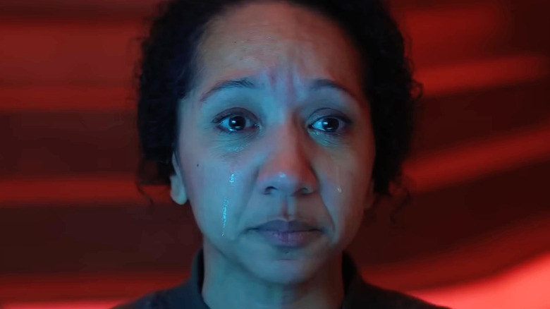 Alexandria Riley as Camille Sims crying in Silo Season 3