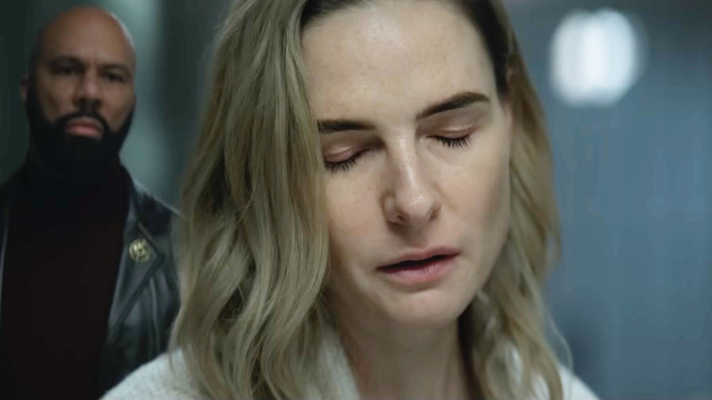 Rebecca Ferguson as Juliette Nichols closing her eyes while Common as Robert Sims looks on in Silo Season 3