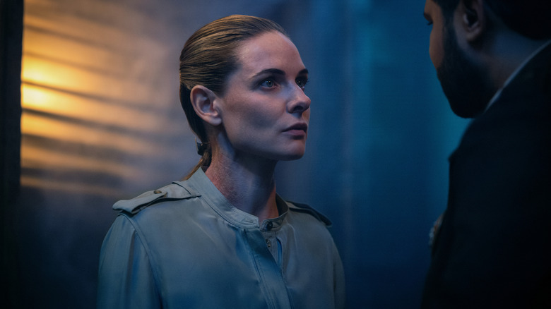 Juliette arguing with her security detail in Silo