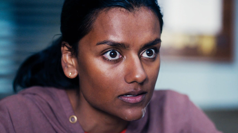 Simone Ashley's Mia is seen in closeup in This Tempting Madness