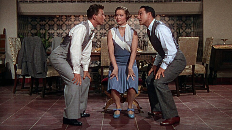 Donald O'Connor, Debbie Reynolds, and Gene Kelly star in Singin' in the Rain (1952)