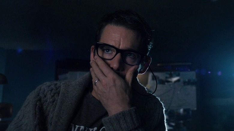 Ethan Hawke as Ellison looking in horror as he watches the super 8 movies in Sinister