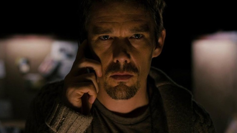 Ethan Hawke as Ellison on phone