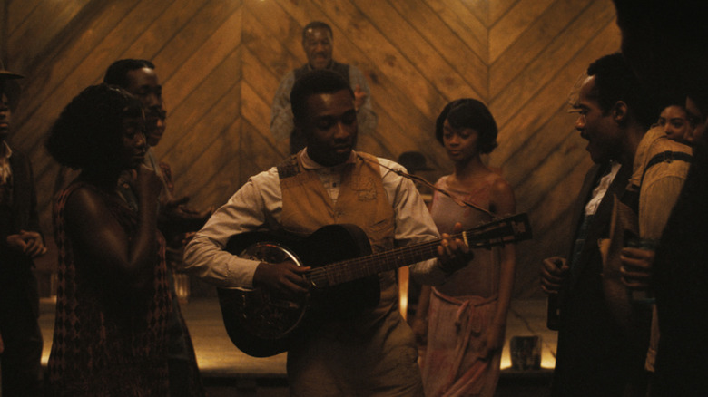 Preacherboy Sammie starts to play his song in Sinners