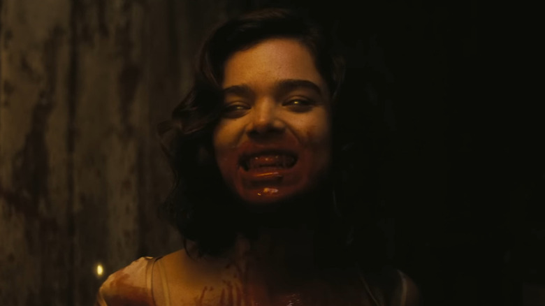 Hailee Steinfeld as Mary with blood dripping from her mouth in Sinners