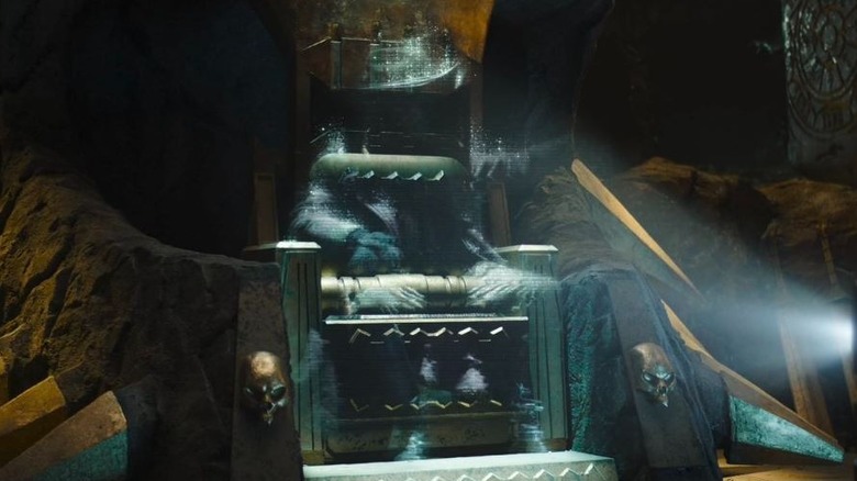 Hologram Tak Rennod sitting on a throne on Star Wars: Skeleton Crew