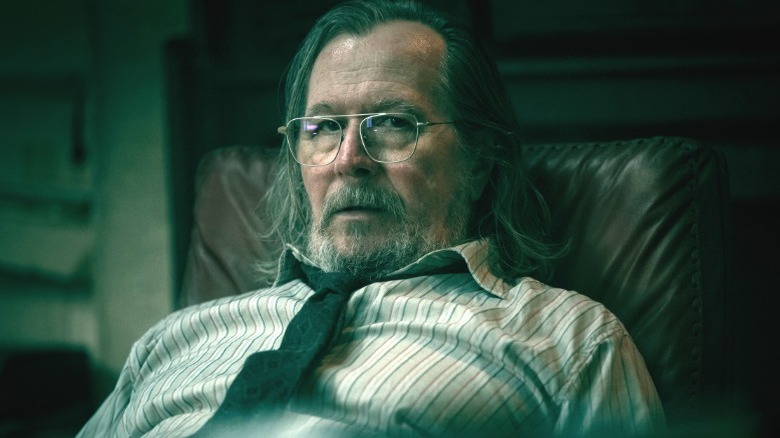 Jackson Lamb slouches in a chair in Slow Horses Season 6