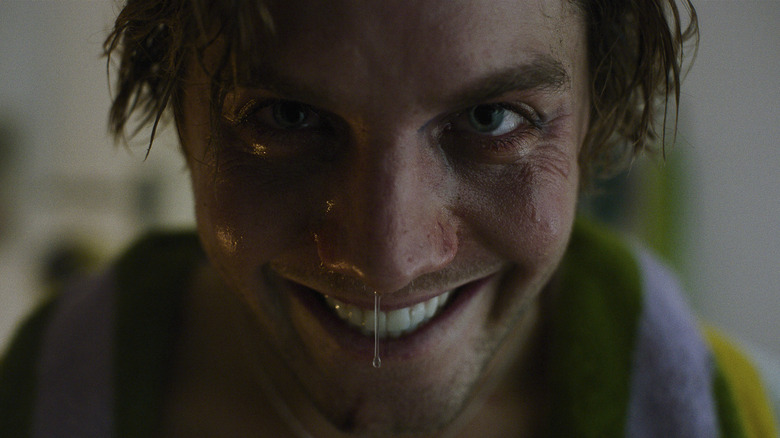 Lewis Fregoli smiling in Smile 2