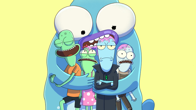 the four teenage and adult characters in solar opposites being hugged and drooled on by a large version of the pupa character