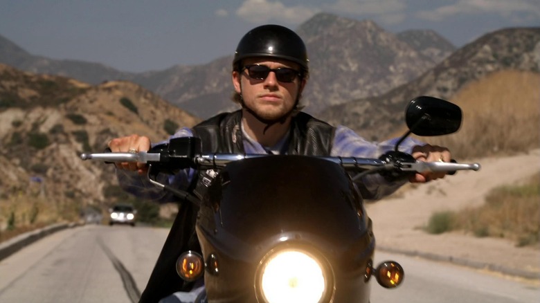 Charlie Hunnam as Jax riding his motorcycle in Sons of Anarchy