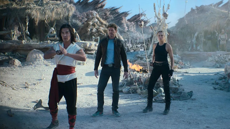 Liu Kang, Johnny Cage, and Sonya Blade look for their next challenge in Mortal Kombat II