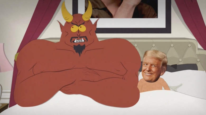 Satan looks angry as he lies in bed next to Trump in South Park