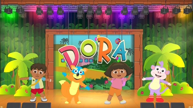 Dora the Explorer and her friends dancing on stage in South Park