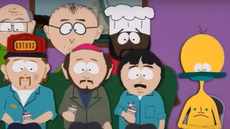 Matt Stone's Jakov the Jakovasaur sitting with townspeople on South Park