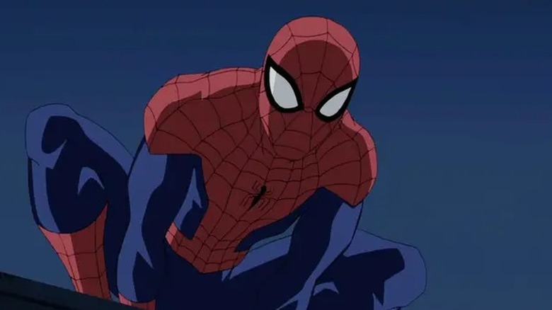 Close-up of Spider-Man crouching on a rooftop in the cartoon Ultimate Spider-Man (2012)