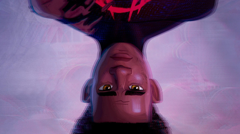 Miles Morales hanging upside-down in Spider-Man: Beyond the Spider-Verse