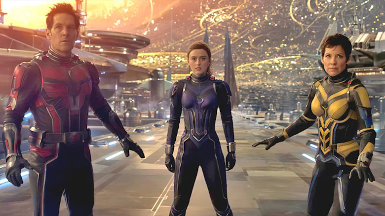 Ant-Man, his daughter, and the Wasp in a Quantumverse city in Ant-Man and the Wasp: Quantumania