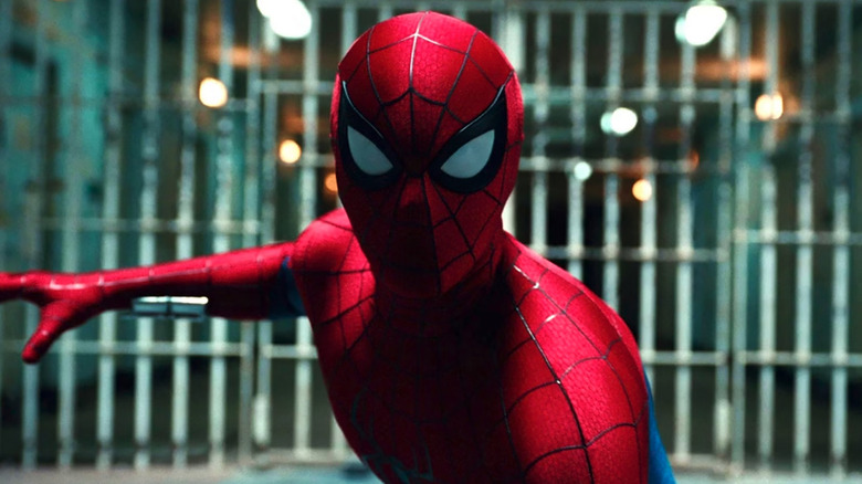 Tom Holland as Peter Parker wearing his superhero suit and standing in a fighting stance in Spider-Man: Brand New Day