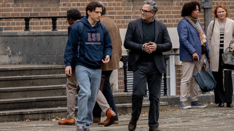 Tom Holland as Peter Parker walking on a city street next to Mark Ruffalo as Bruce Banner in Spider-Man: Brand New Day