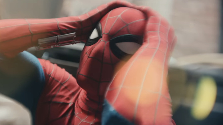 Tom Holland's Spider-Man holds his head in Spider-Man Brand New Day
