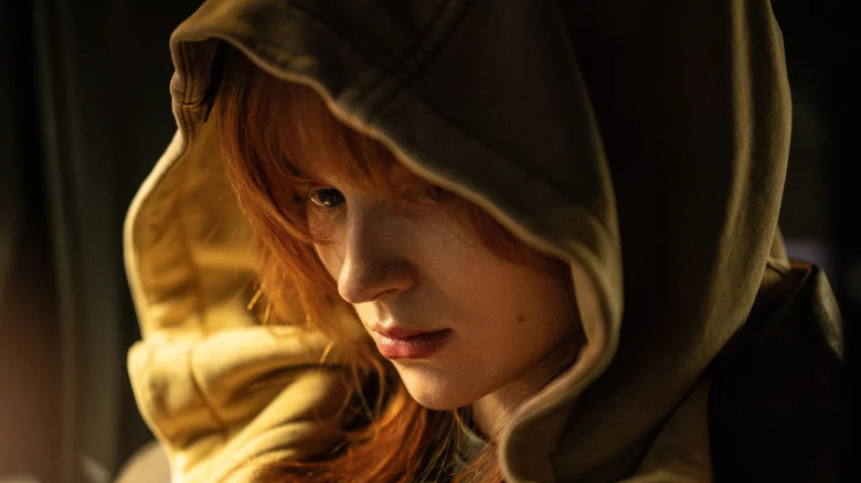 Jean Grey sitting in a car in Spider-Man: Brand New Day