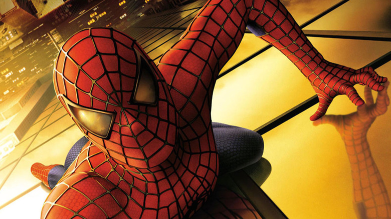Spider-Man (2002) poster of Spider-Man climbing skyscraper