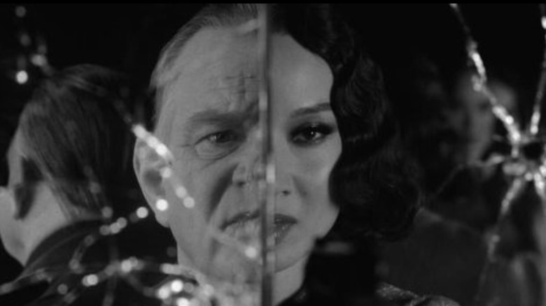 Spider-Noir - Silvermane and Cat Hardy's face divided by broken mirror