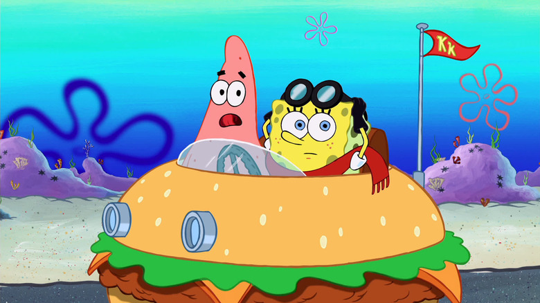 Bob l'éponge et Patrick conduisent une voiture à hamburger dans le film Bob l'éponge
