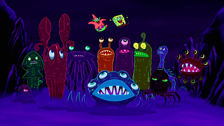 Bob l'éponge et Patrick évitent l'attaque d'une bande de monstres des tranchées dans le film Bob l'éponge.