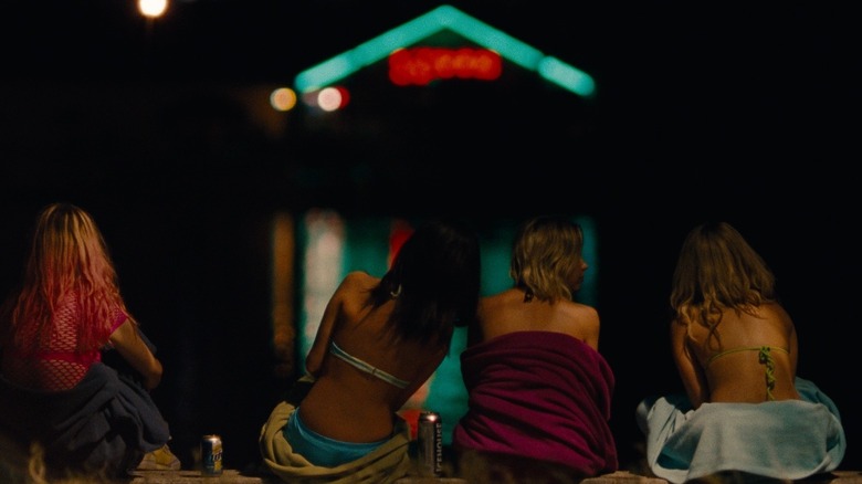 A group of girls sitting next to each other in Spring Breakers
