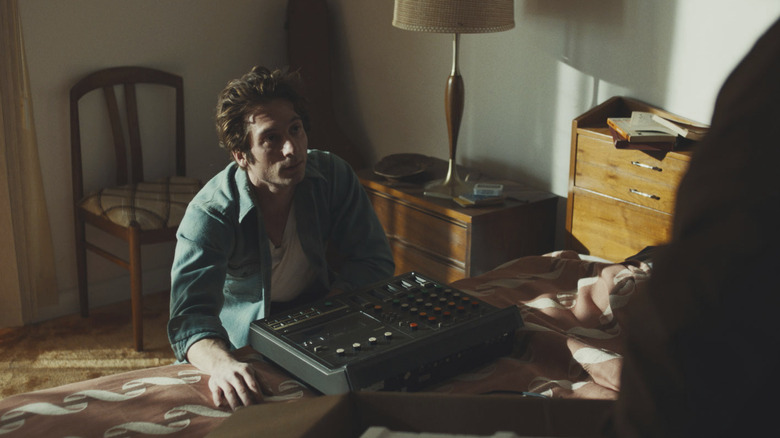 Bruce Springsteen is in his bedroom with a recording device in Springsteen: Deliver Me from Nowhere