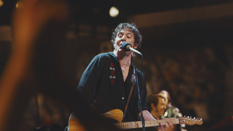 Bruce Springsteen sings on stage in Springsteen: Deliver Me from Nowhere