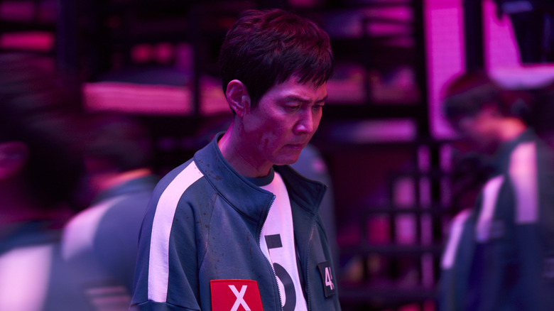 Seong Gi-hun looking down in Squid Game