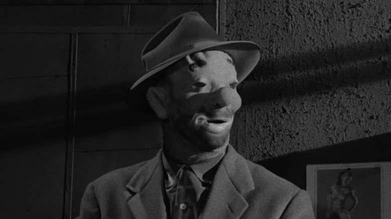 A masked Johnny Clay (Sterling Hayden) in The Killing (1956)