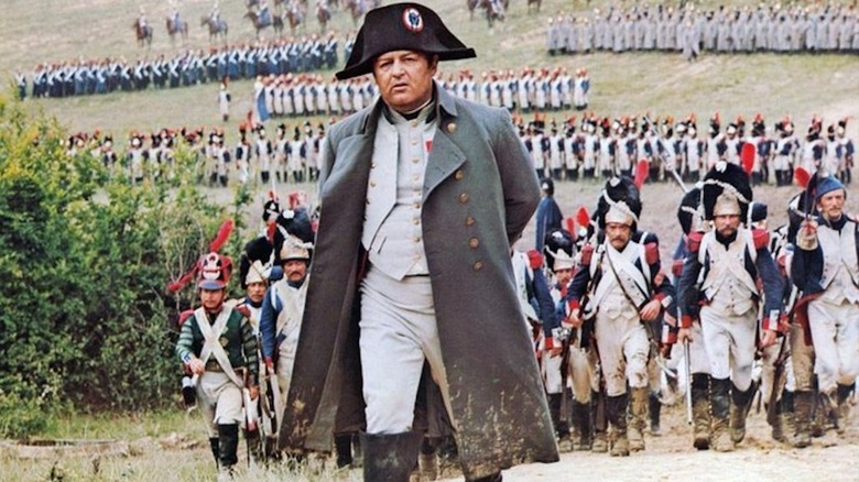 Rod Steiger stands out in the middle of a battlefield as Napoleon Bonaparte in Waterloo