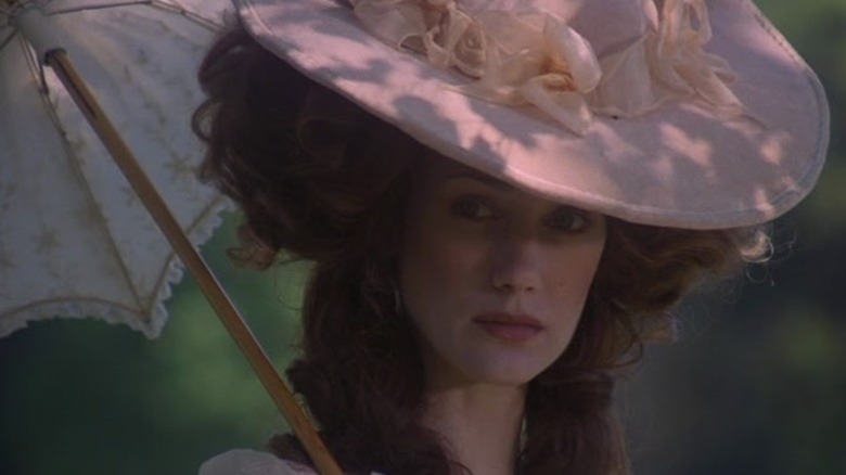 Marisa Berenson hat parasol