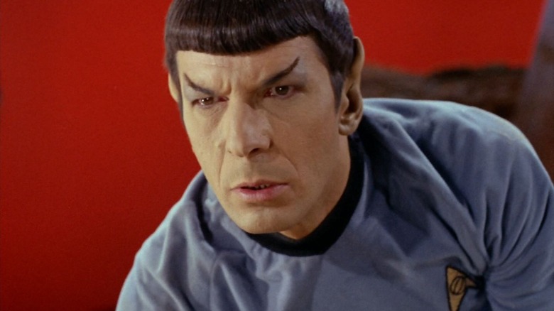 Spock looking angry against a red sky on Star Trek