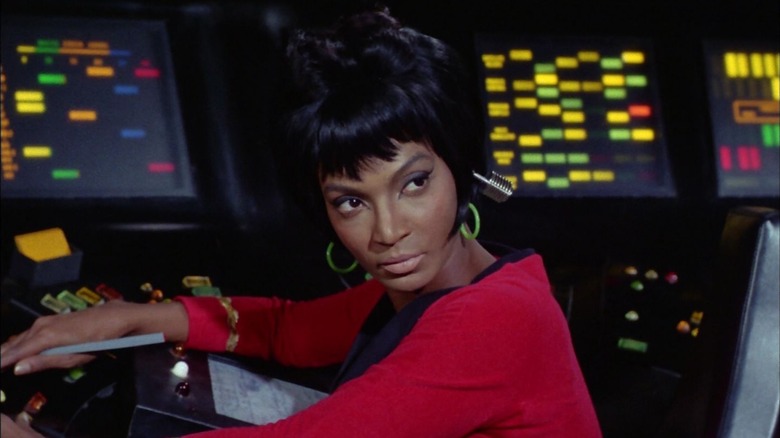 Uhura at the communications station on Star Trek
