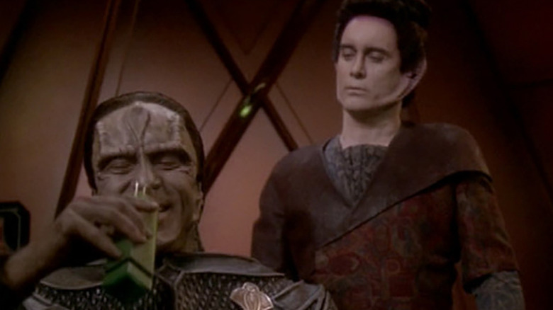 Damar drinking while Weyoun looks on on Star Trek: Deep Space Nine
