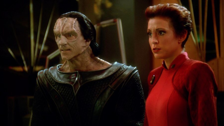 Marc Alaimo as Gul Dukat and Nana Visitor as Kira Nerys standing side by side on Star Trek: Deep Space Nine