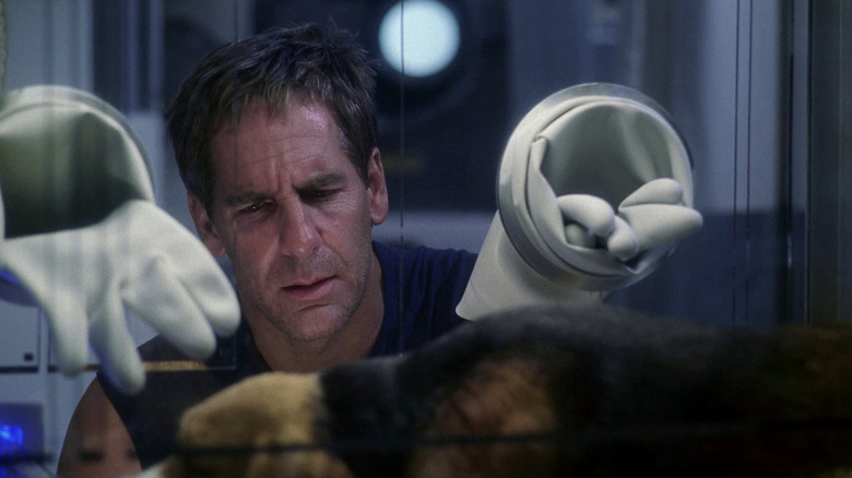 Captain Archer looking at his poor sick dog on Star Trek: Enterprise