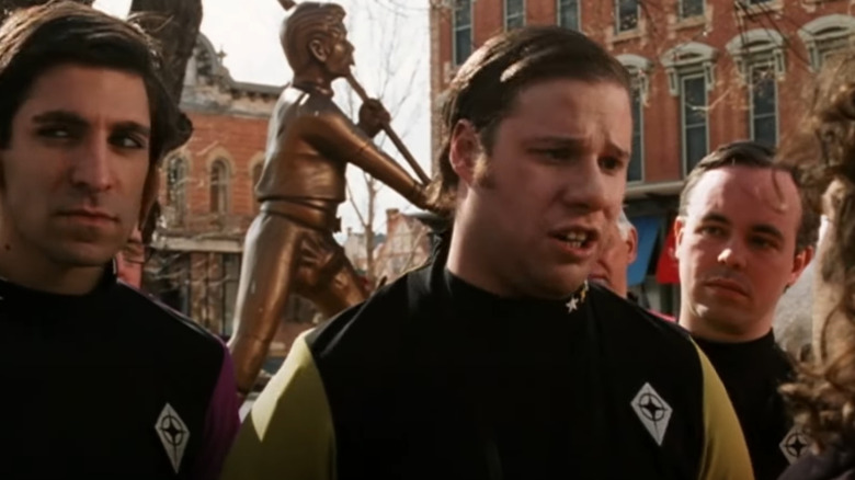 Seth Rogen as an obsessive Trek fan in Fanboys, in front of a fake Kirk statue